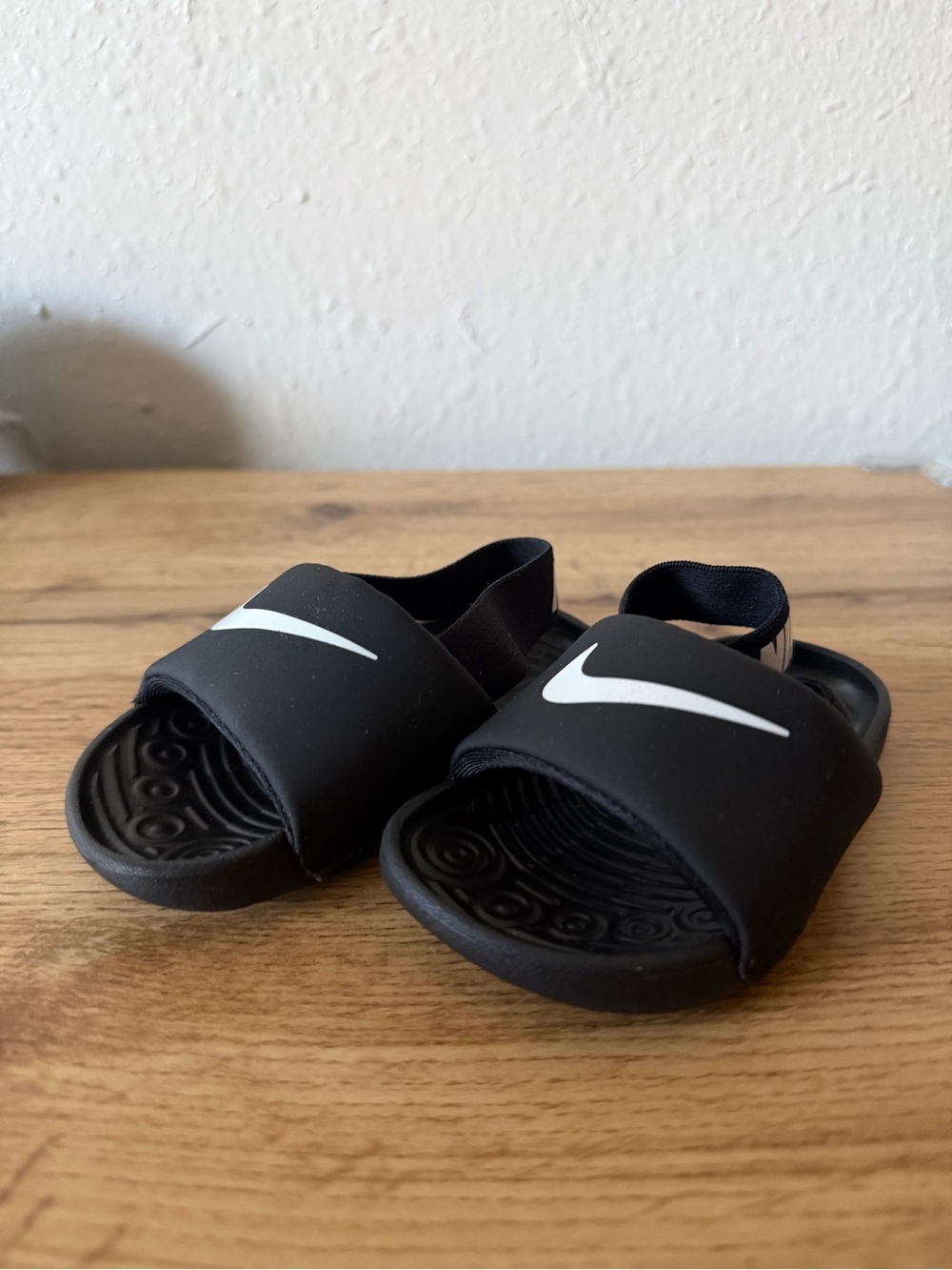 Nike Kids Black Slide Sandals with White Swoosh